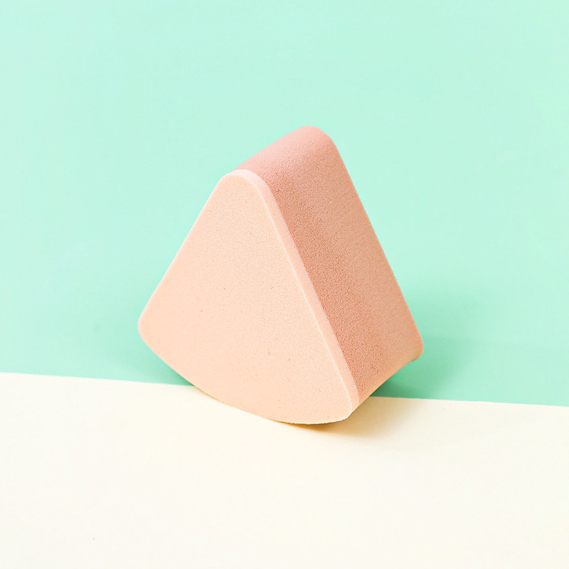 Fábrica personalizada de polvo de esponja triangular no comer polvo seco y húmedo de doble uso en agua de remojo para aumentar el maquillaje no látex de gel de goma cosmética