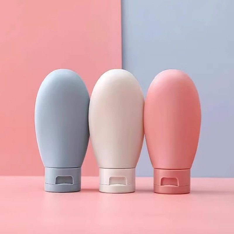 Cosméticos Viajes Subbotella Manguera Juego de extrusión Botella de champú portátil Botella de loción extruida con tapa abatible 60ml