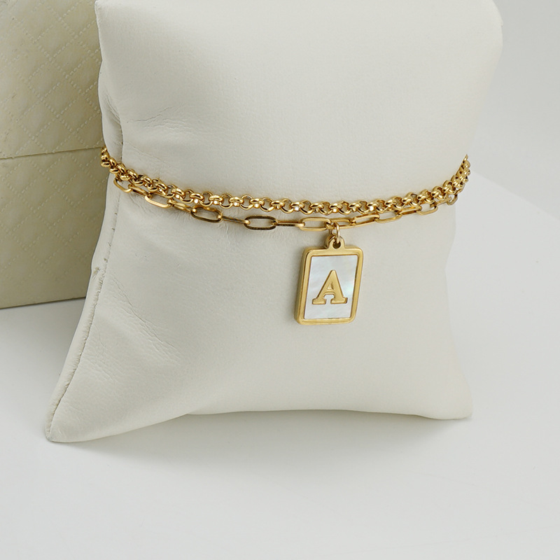 9g Weight PVD Coated Gold Plating Process 18K Gold Plated Plating Material Fashion Letter 304 Stainless Steel 18K Gold Plated Shell Stainless Steel Bracelets In Bulk
