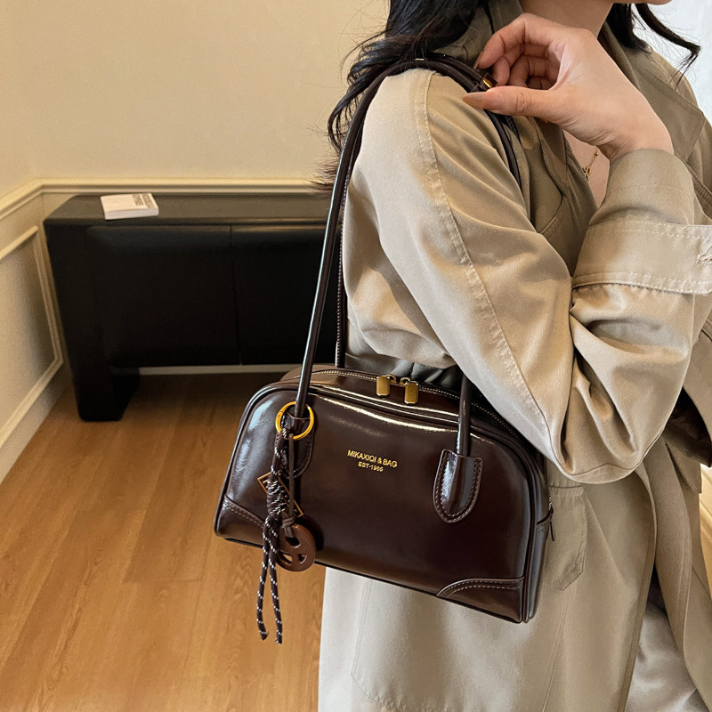 Bolso retro transfronterizo bolso de bolos de alta calidad para mujeres otoño y invierno 2025 nueva moda ocio bolso axilar de hombro único