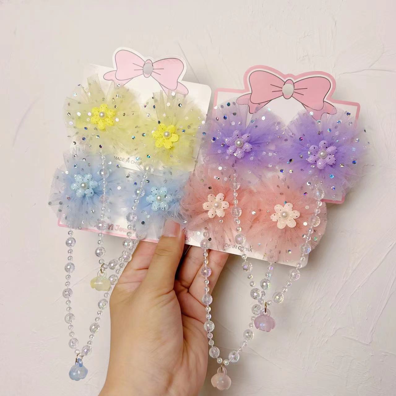 Flores de malla para niños nuevas tarjetas de cabello de niña super inmortal bebé trenzado cadena de cabello adornamiento de cabello estilo chino clip de ropa Han