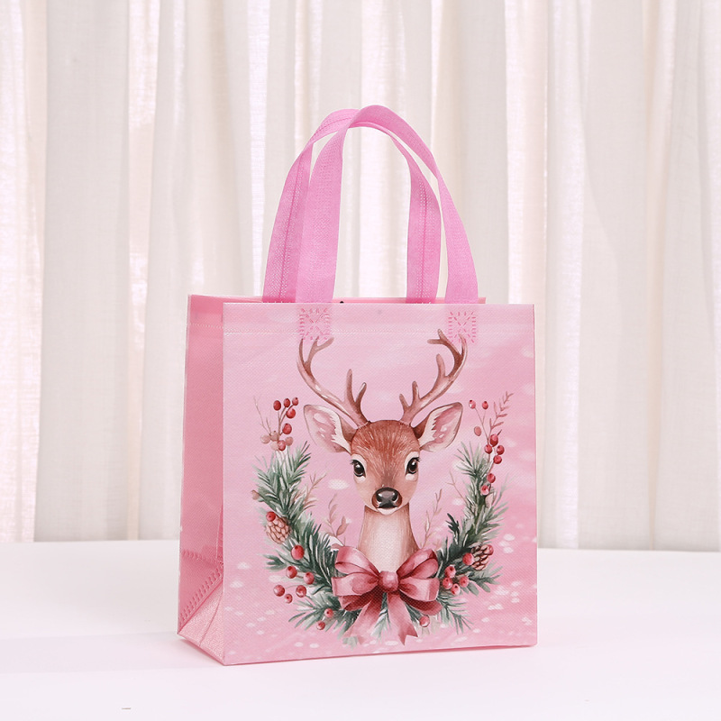 ピンクのクリスマスプリントホリデーギフト包装袋不織布ポータブルギフトバッグショッピングバッグ卸売|undefined