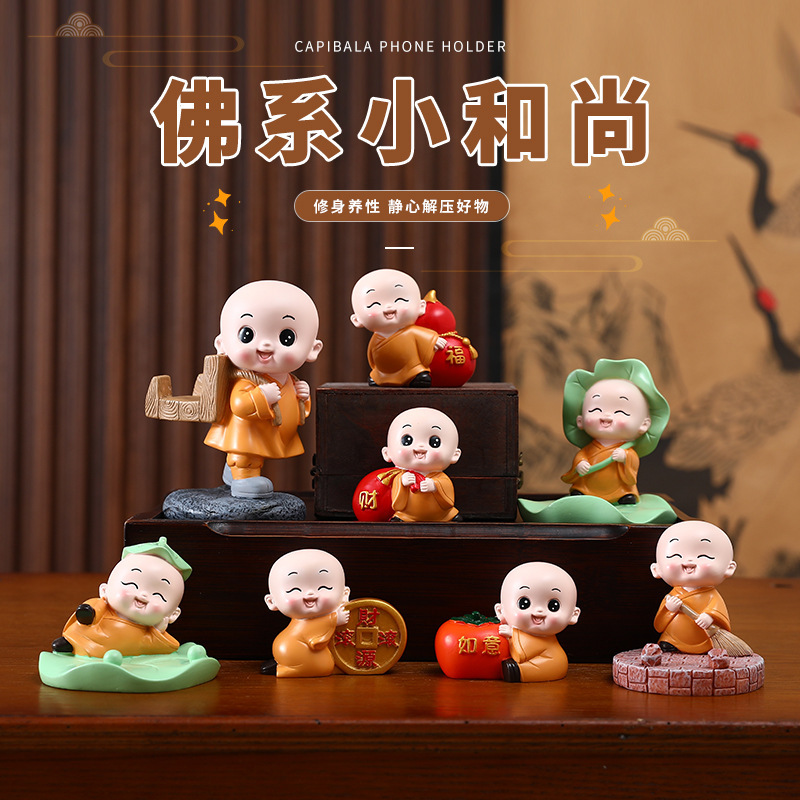 Zen monk car shake head ornaments creative personality mobile phone bracket car center console decoration ornaments wholesale