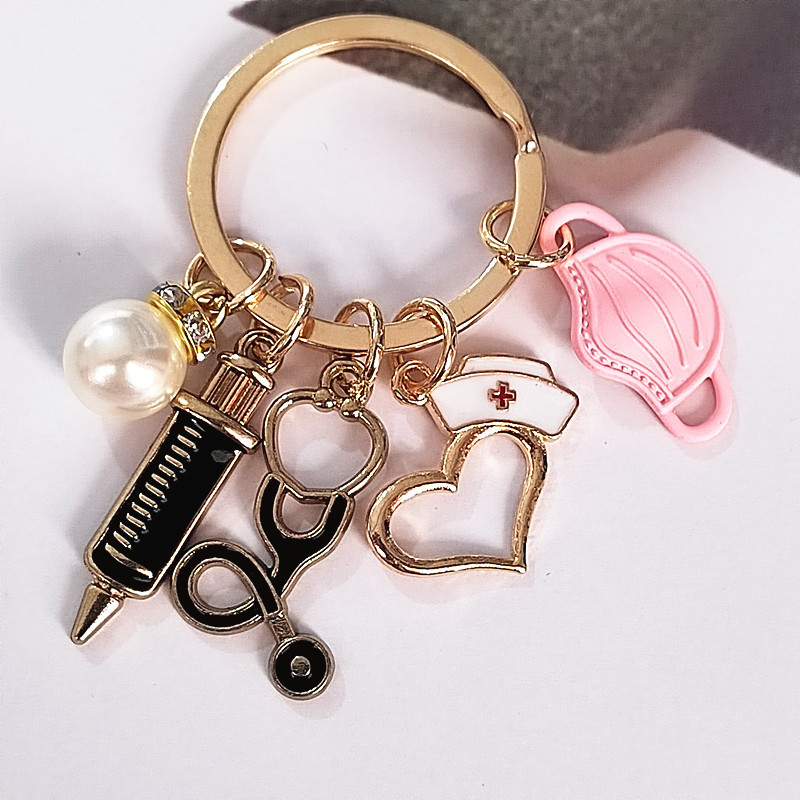 Llavero médico nuevo transfronterizo enfermera doctor jeringa estetoscopio personal