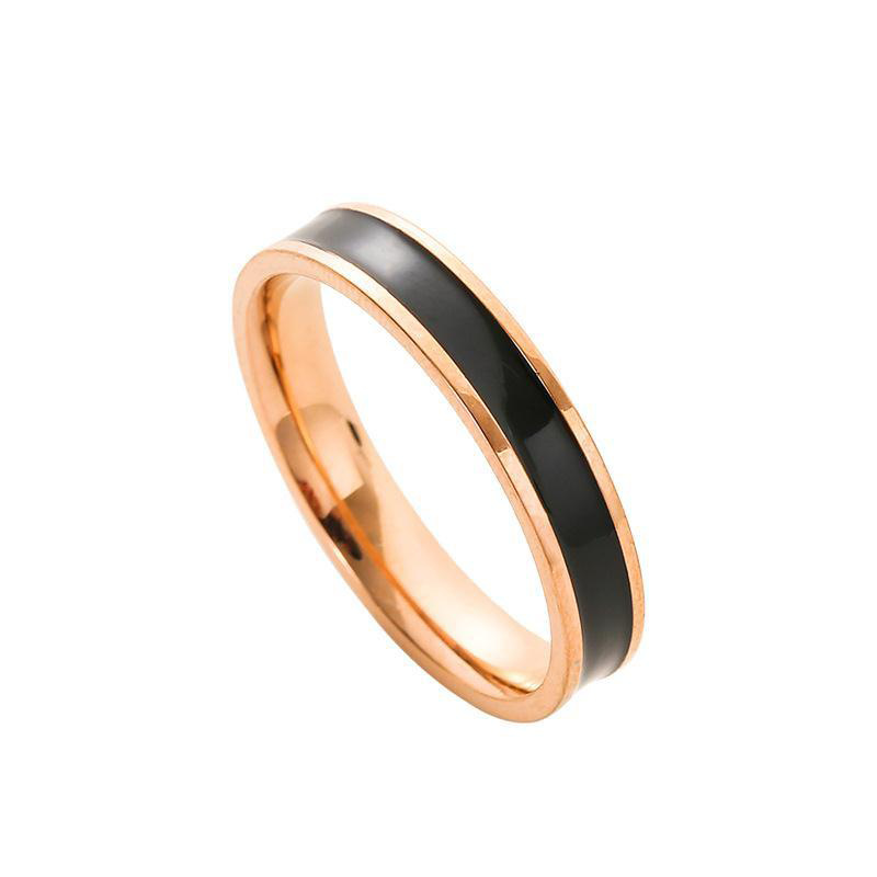 Personalidad de moda anillo de dedo índice de viento frío epoxi en blanco y negro femenino europeo y americano simple