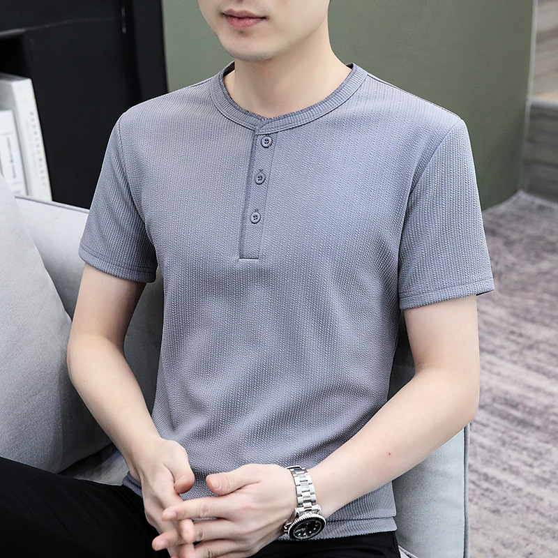 Verano de ropa de hombre de manga corta nueva tendencia de color sólido, camiseta de polo casual de cuello redondo para hombre