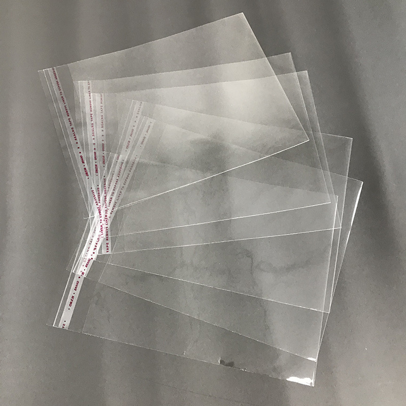 En stock venta al por mayor bolsa de OPP camisa de ropa bolsa de embalaje bolsa de plástico transparente Ziplock impresión adhesiva bolsa autoadhesiva