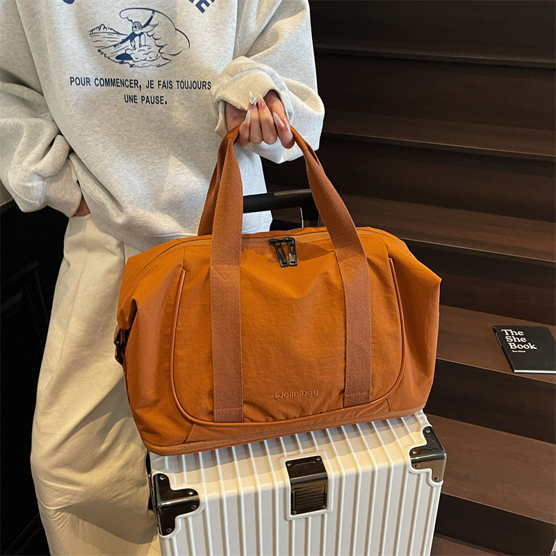Bolso de viaje portátil coreano transfronterizo nuevo bolso de gimnasio ligero de gran capacidad bolso de viaje de viaje simple de ocio