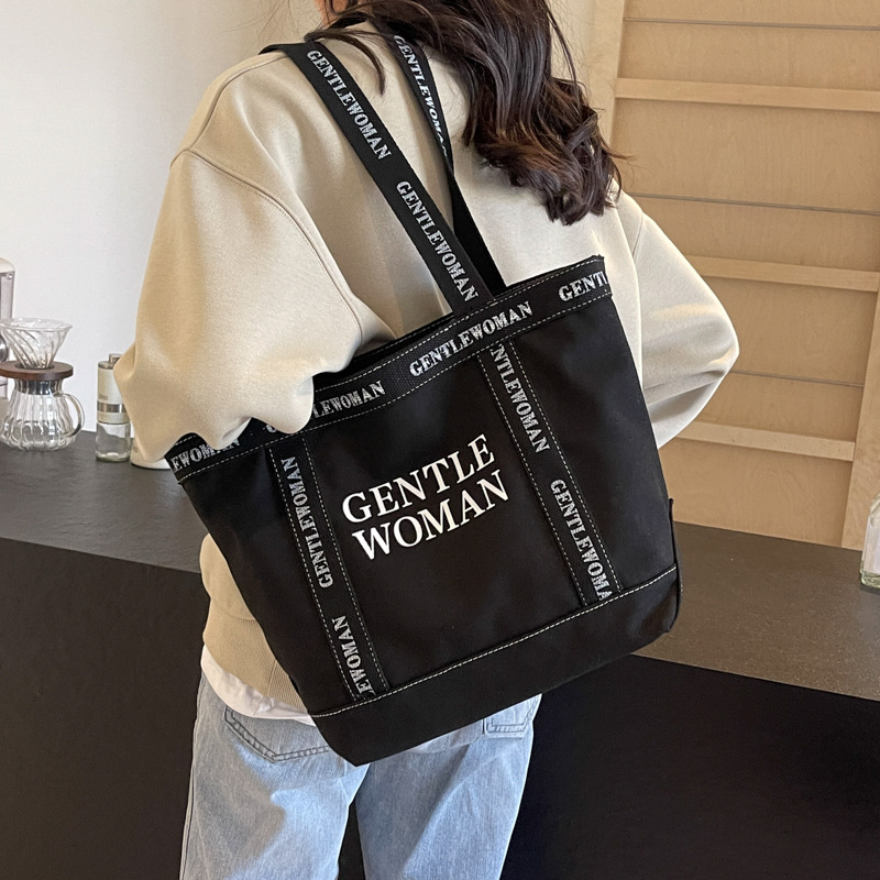 Moda simple lienzo impreso carta bolsa de hombro 2024 gran capacidad de trabajo de alta calidad bolso de mano