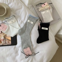 春夏の薄いタイプの25新型の靴下の女性のアルファベットの布の標準の双羅の口の百合の中筒の靴下の洋の空気の通気性の縦条の卸売り