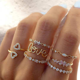 欧美跨境新款金色组合关节戒指创意时尚爱心Love点钻7件戒指套装