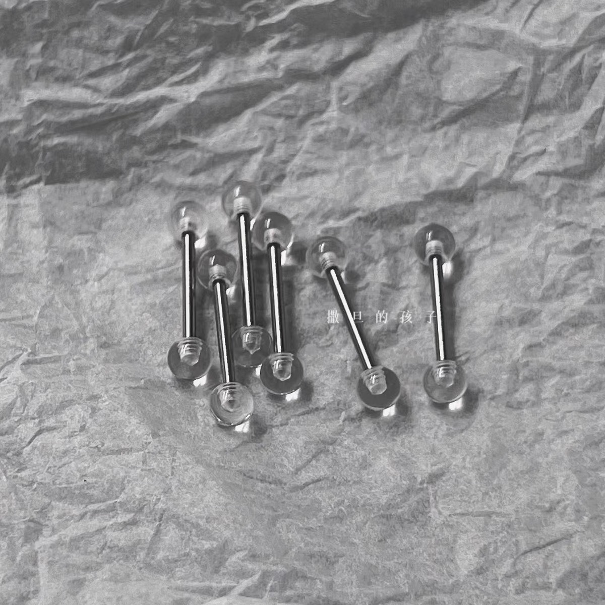 Silver pointed spike labret stud material detail