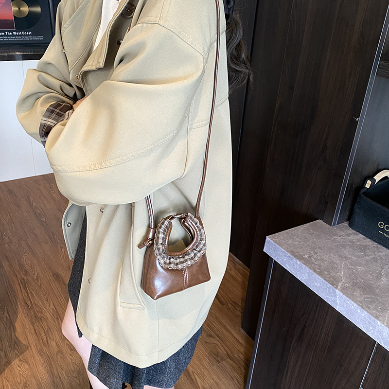 2025 otoño / invierno nuevo bolso infantil lindos bolsos de bebé de encaje redondo bolsos de mano mini niños de color sólido