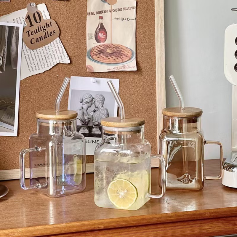 Nuevo producto Taza de paja cuadrada especial Vaso de vidrio con tapa de borosilicato Taza de jugo Gran capacidad y mango de alto valor