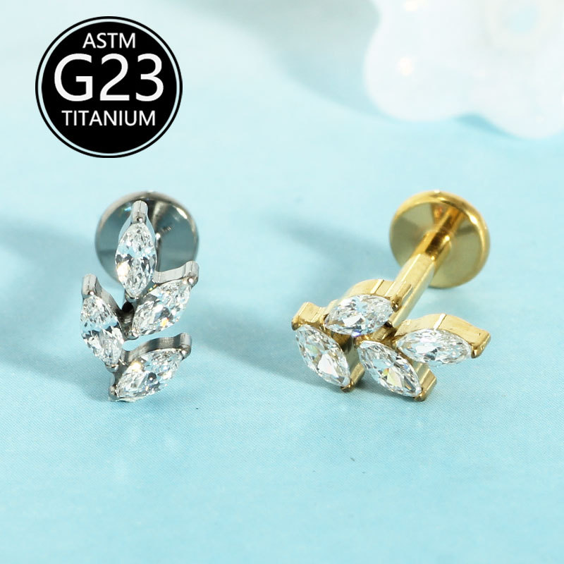 Silver pointed spike labret stud material detail
