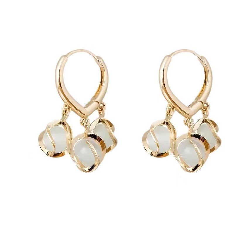 Nueva moda de lujo ligero de alto grado hebilla elegante imitación gato ojo pendientes nicho femenino diseño personalidad Internet celebridad pendientes moda