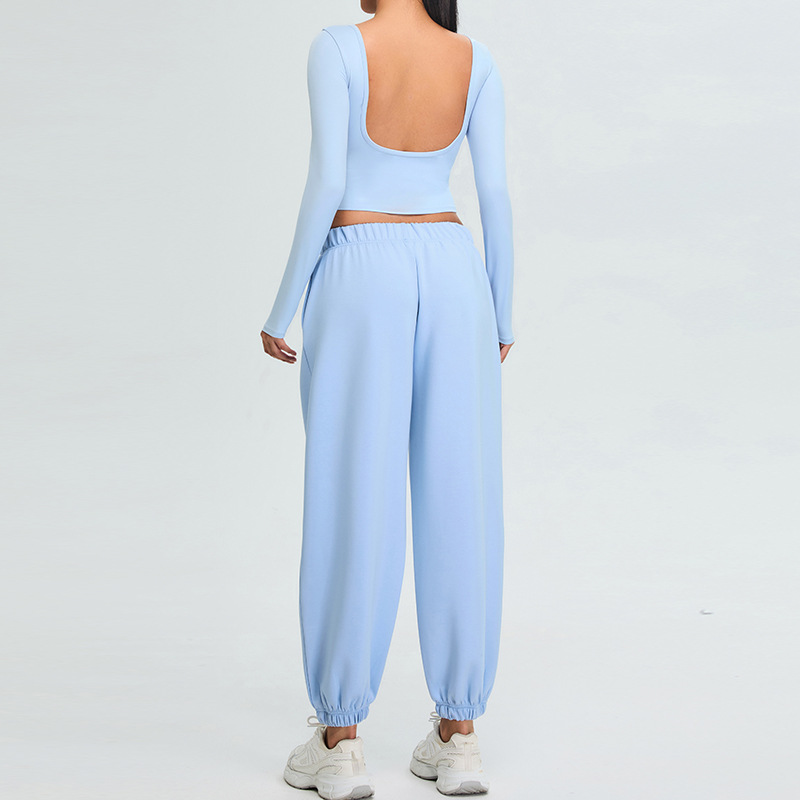 Otoño y invierno nuevo conjunto deportivo delgado de mujer U belleza de espalda manga larga ropa de yoga chaqueta de correr pantalones de fitness