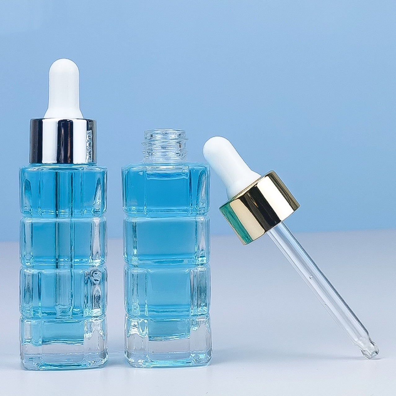 Nuevo en stock 30ml de alto grado a cuadros transparente esencia botella cuidado de la piel cosméticos esencia