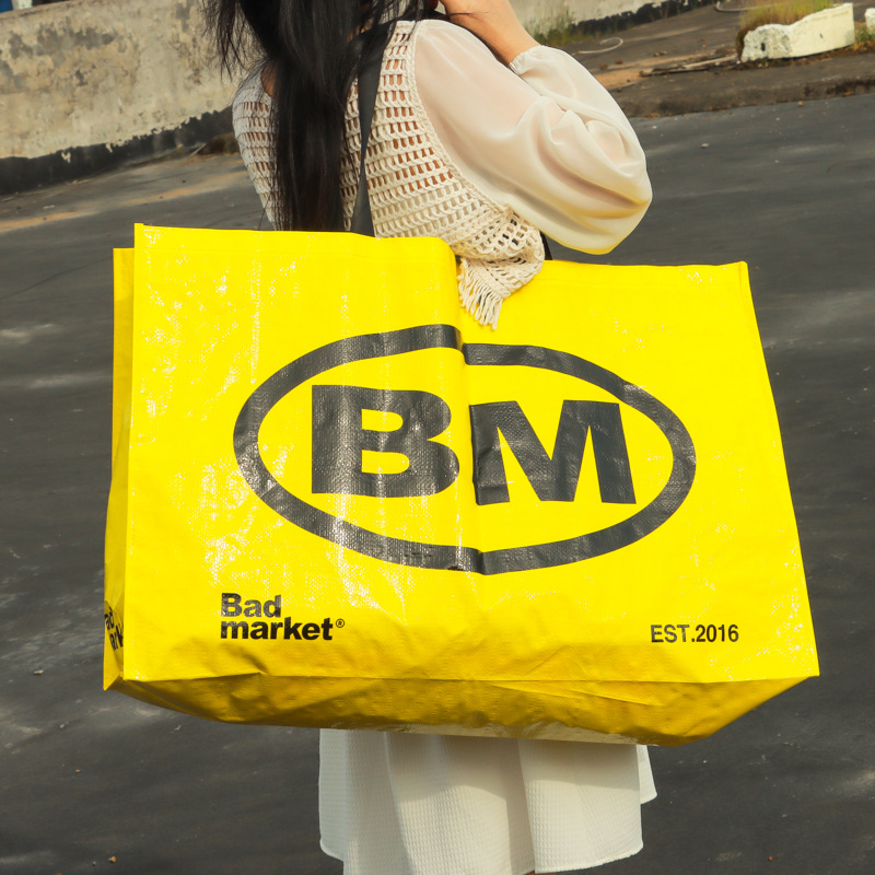 覆膜编织购物手提袋 LOGO印字编织蛇皮手提袋 彩印覆膜广告编织袋