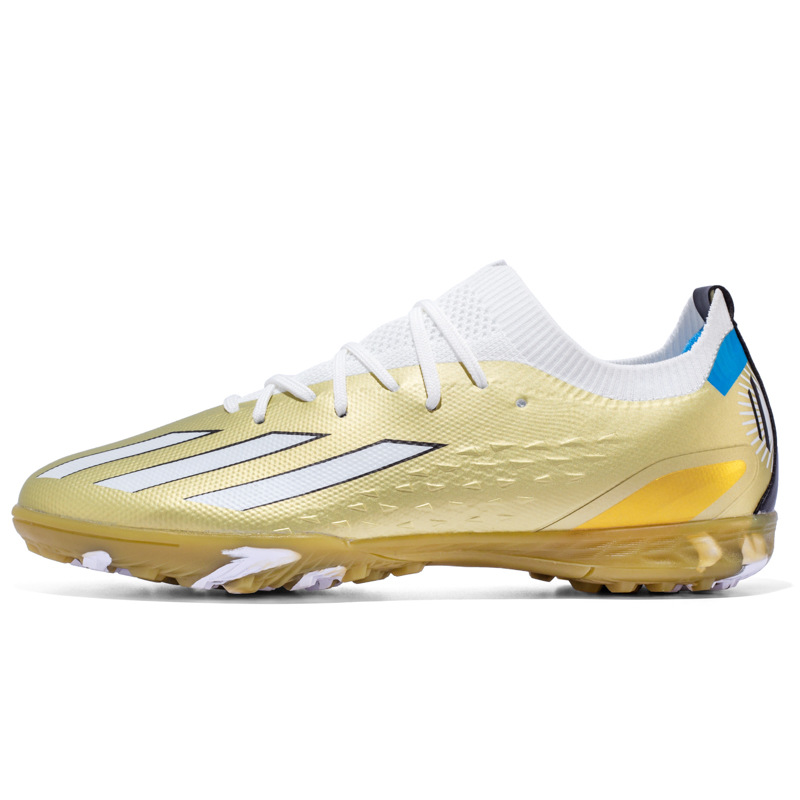 Nuevos juveniles transfronterizos de clavos largos de clavos deportivos de baja altura de la Copa del Mundo TF zapatos de fútbol entrenamiento al por mayor