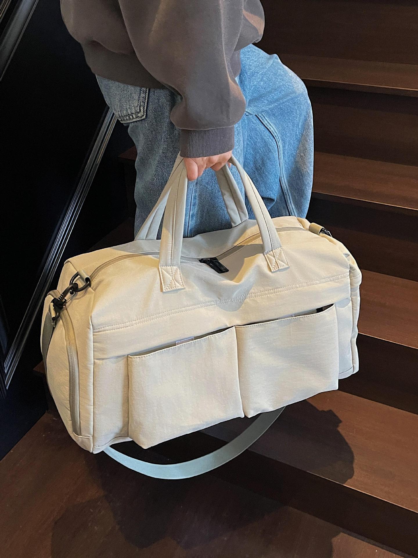 Bolsa de viaje corto de gran capacidad nueva bolsa deportiva de fitness viaje de negocios almacenamiento de embarque de separación seca y húmeda bolsa de mano