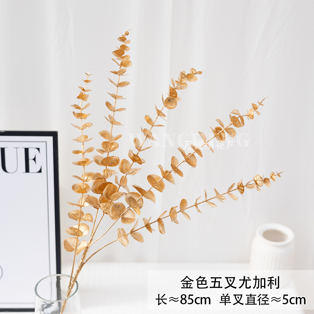 Flores artificiales doradas para Navidad