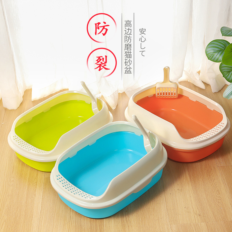 Caja de arena para gatos en stock al por mayor de alto borde a prueba de grietas de tamaño pequeño caja de arena para gatos naranja resistente a las caídas PP resina de cuero Taobao gato inodoro