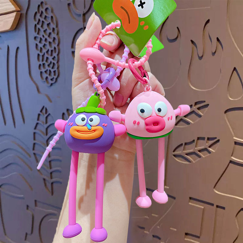 Cartoon stretch ugly fruit gentleman keychain creative pull decompression doll couple car bag pendant gift Cartoon stretch ugly fruit gentleman keychain creative pull decompression doll couple car bag pendant gift