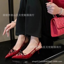 谬尖头蝴蝶结包头凉鞋女款2025早春新款后空镂空交叉带细跟高跟鞋