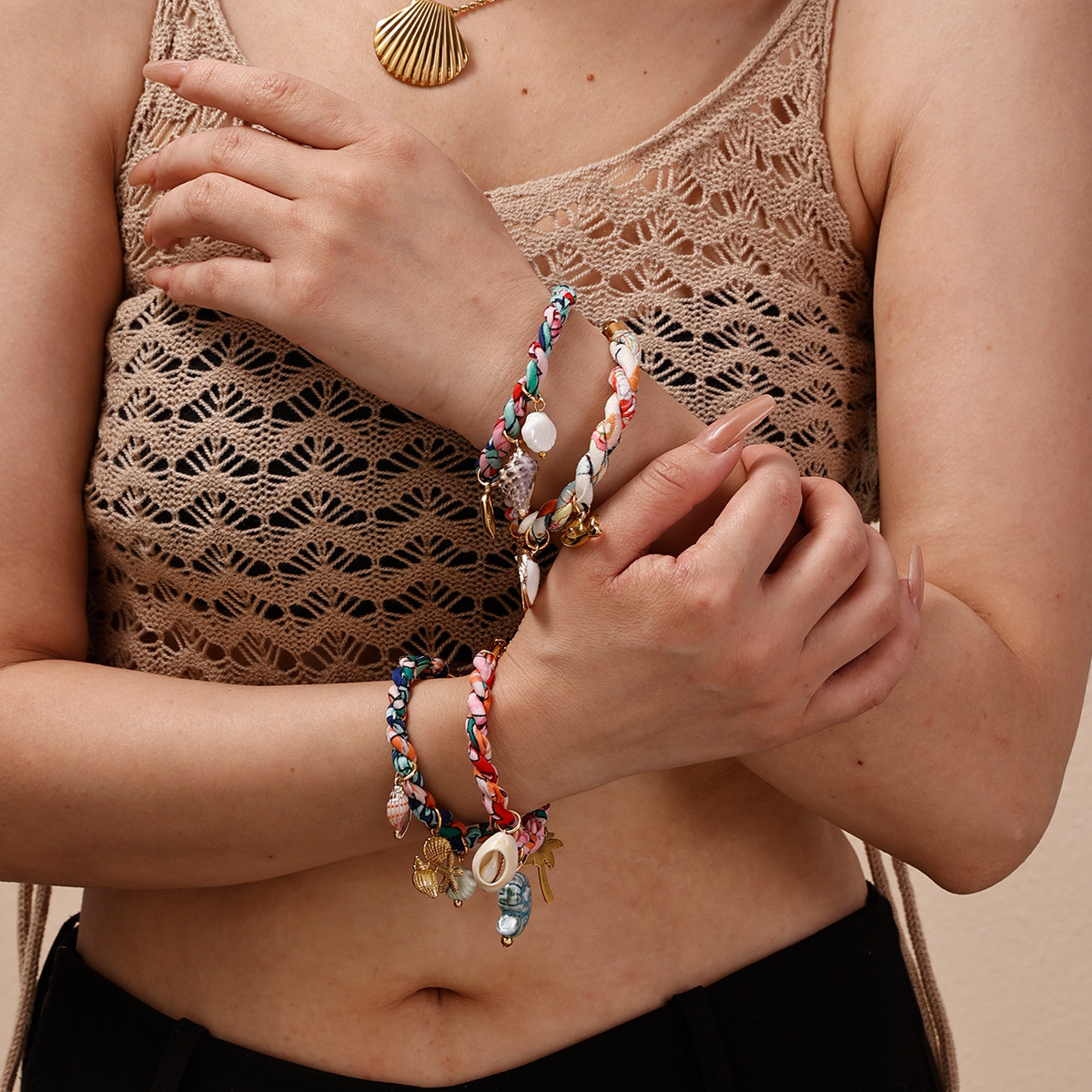 Tena Pulsera de acero inoxidable europea y americana Pulsera tejida de cuerda gruesa de alta calidad de lujo ligero Pulsera de cerámica de concha Estilo explosivo transfronterizo