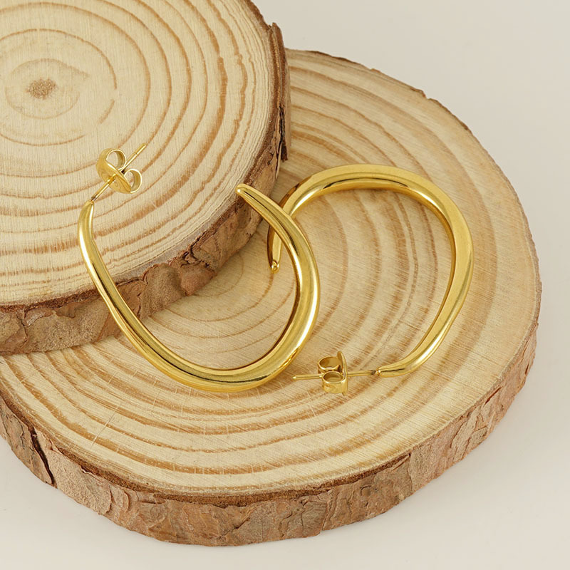 Transfronterizo europeo y americano ins retro exagerado en forma de U pendientes de acero de titanio hembra 18K pendientes de acero inoxidable joyería al por mayor