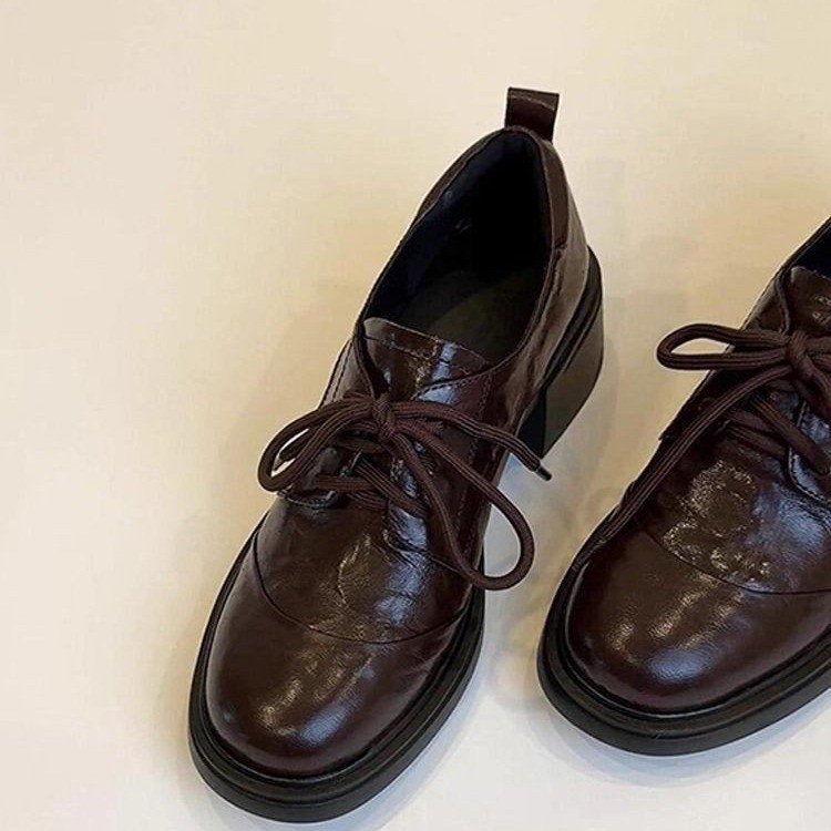 Gran Bretaña retro redonda cabeza de lazos zapatos Lefour otoño / invierno 2025 nuevo estilo de viaje versátil zapatos de cuero de tacón grueso zapatos de mujer