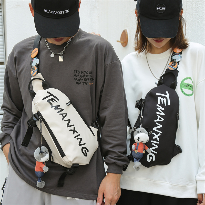 Bolso de los hombres bolsa de mensajero de moda mochila niños nicho deportes bolso casual bolso de hombro de las mujeres personalidad bolsa de pecho japonés