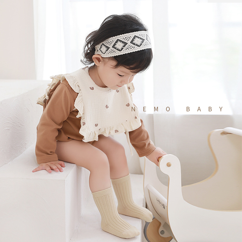 2023 otoño nuevo bebé calcetines transpirable boca suelta Corea del Sur color sólido moda niños y niñas niños medianos y grandes calcetines de algodón de media pantorrilla