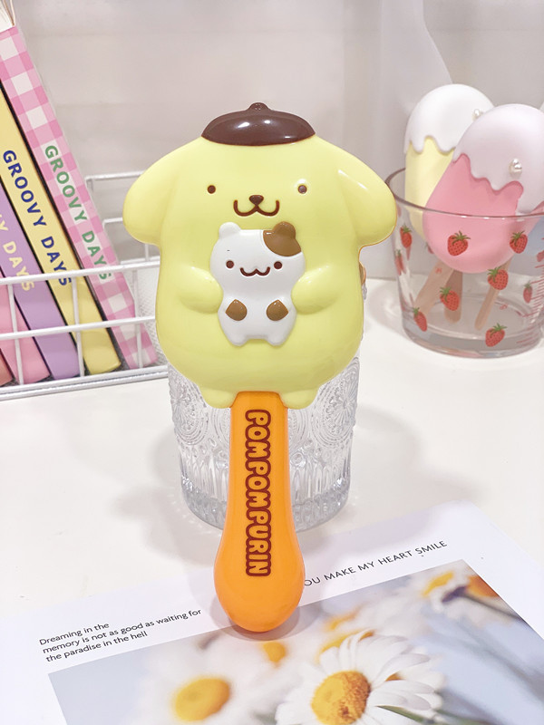 Peine globo de masaje-pudín