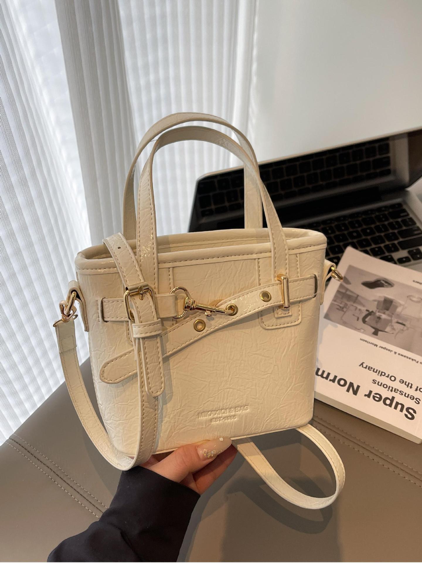 Comercio exterior de cercanías bolso de cubo de mano de todo fósforo femenino 2025 nuevo bolso de canasta de verduras de tendencia de todo fósforo bolso de mensajero de sentido avanzado