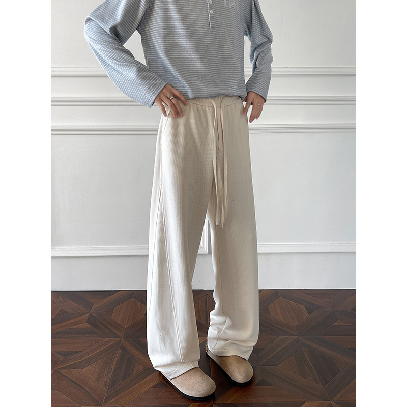 Pantaloni della tuta in stile americano con taglio obliquo e orlo curvo per uomo e donna, primavera, pesanti, vestibilità pulita, vestibilità ampia e casual di alta qualità._voghion.com