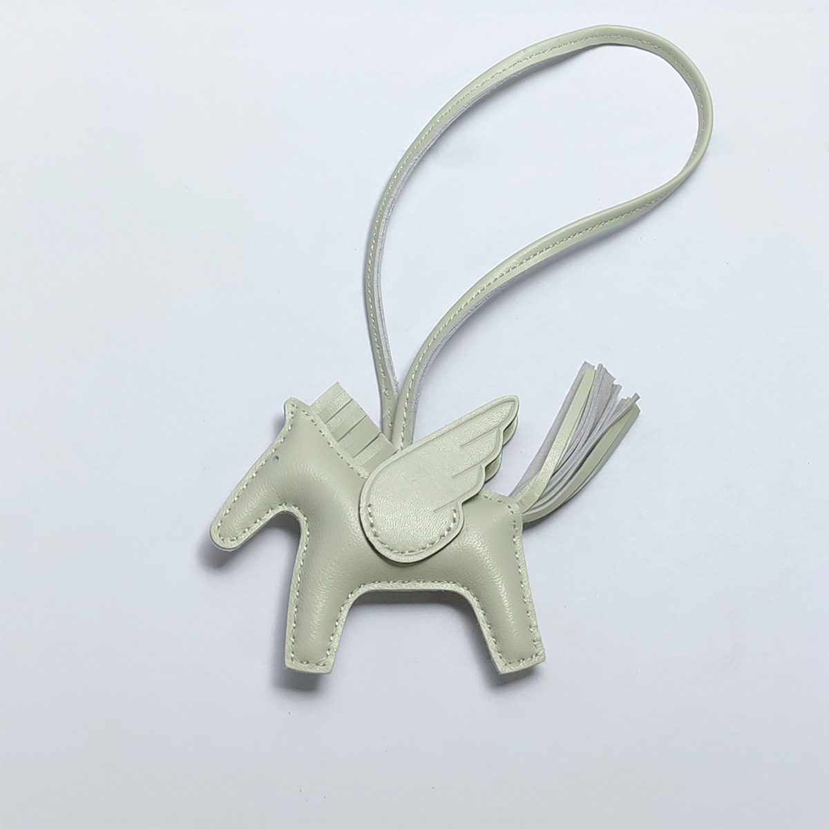 Cute Angel Little Pegasus Colgante Pit Edition H Home Colgante de bolso de caballo cosido a mano Colgante de cuero de oveja Llavero Colgante
