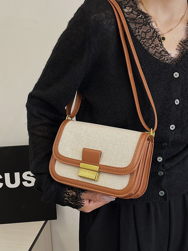 Alta sensación retro bolso pequeño para mujeres 2025 nueva moda transfronteriza color contrastante empalme viaje mochila de hombro