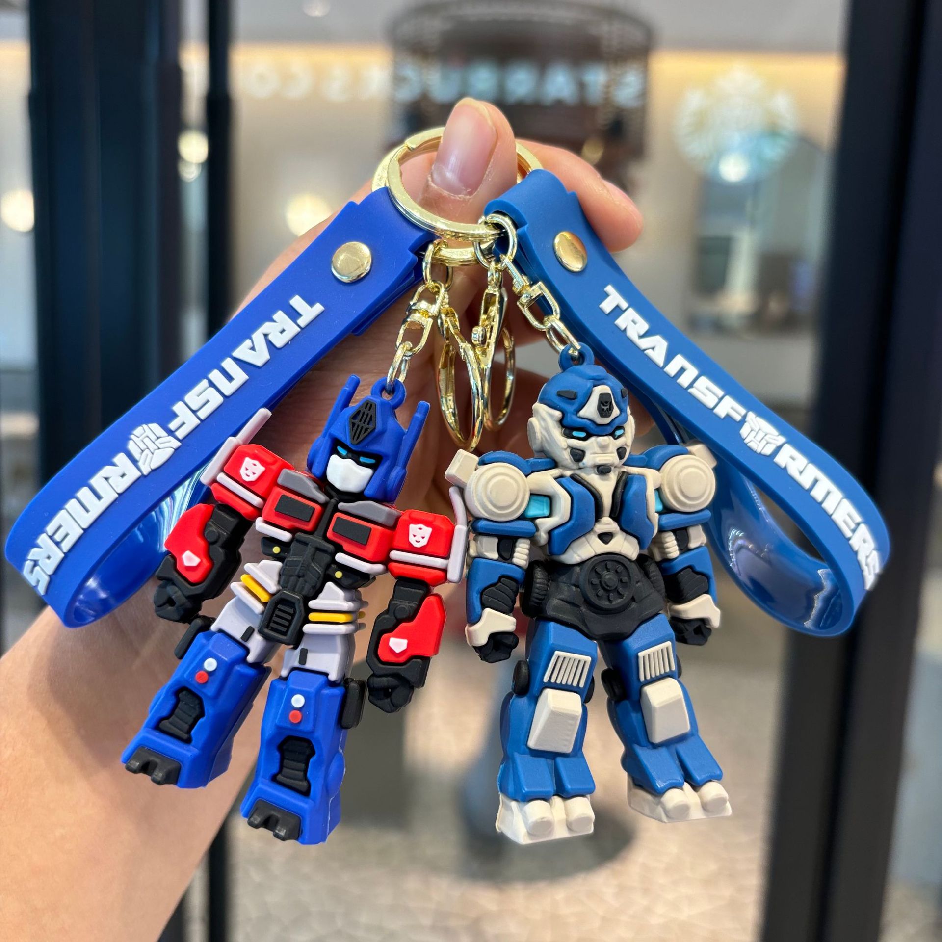 Nuevos productos Transformers colgante llavero tira muñeca máquina de pareja colgante transfronterizo exclusivo para la abeja creativa