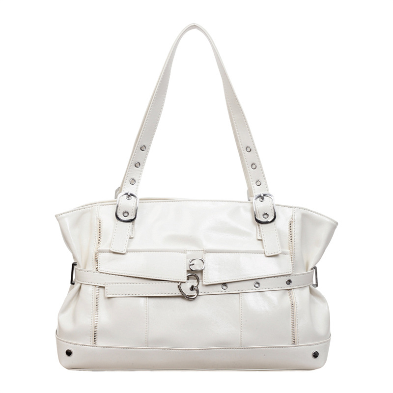 Bolsa de motocicleta de chicas calientes retro para mujeres 2026 verano nuevo nicho de lujo ligero bolso de hombro de brazo bolso de viaje transfronterizo