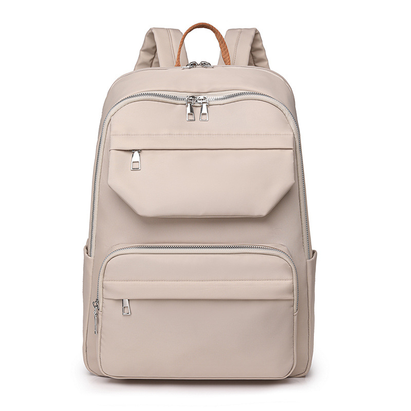 Venta directa de fábrica 2024 nuevo estilo coreano de las mujeres de nylon mochila simple todo partido Gran capacidad ordenador estudiante mochila