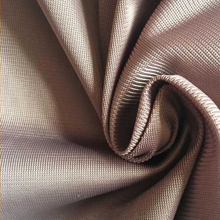工厂在线新款特价 全涤针织平板布服装面料 涤纶经编布TRICOT