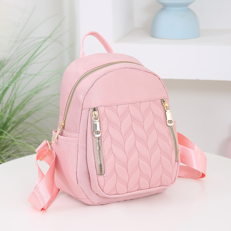 Mochila de moda transfronteriza para mujer, nueva mochila casual de rombo simple, bolsa de tela de color sólido de tendencia coreana al por mayor