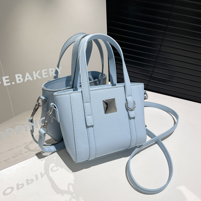 Bolso Tote popular de este año 2025 verano nuevo bolso de hombro con patrón de lichi mini bolso de mensajero de todo fósforo mujer