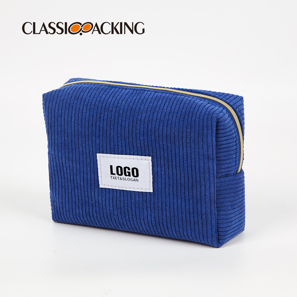 Fabricante de diseño de bolsa de almacenamiento de pana logotipo simple moda rayas bolsa de cosméticos ins bolsa de almacenamiento súper caliente