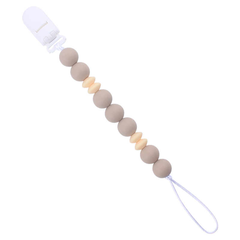 Nuevo bebé suministros chupete cadena creativa DIY macaron color serie mordedura de pegamento cadena anti-caída