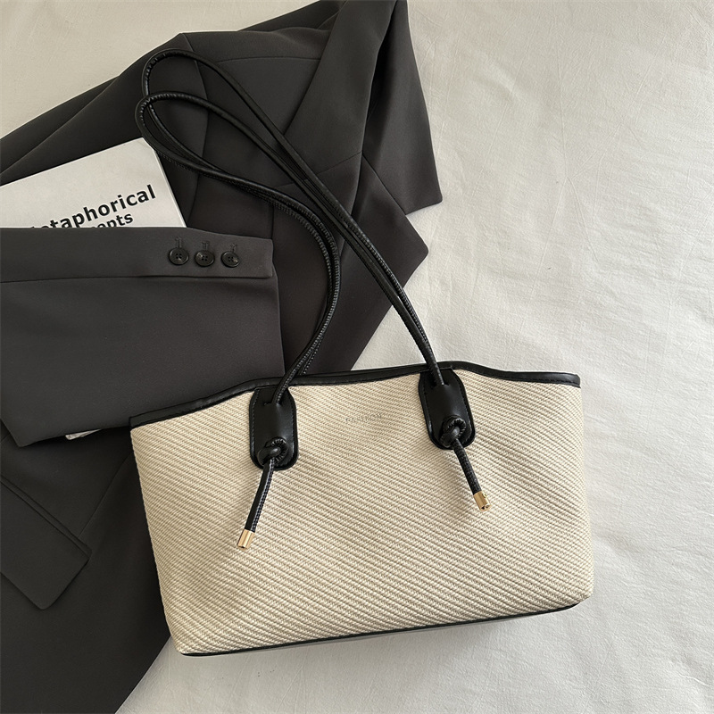 Bolso de viaje portátil primavera / verano para mujeres 2025 nuevo bolso de moda, bolso de hombro de gran capacidad, bolso de mujer de alta calidad