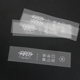 洗唛、商标;布贴;吊粒、吊牌