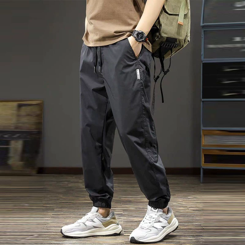 Осенние и летние новые повседневные брюки для мужчин, свободные большие размеры, спортивные шаровары с завязками на ногах, модная брендовая летняя рабочая одежда, повседневные брюки для мужчин
